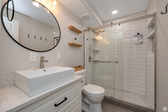 588 E Vine St S Unit 2C, Murray, UT 84107 - bathroom featuring a stall shower, vanity, and recessed lighting