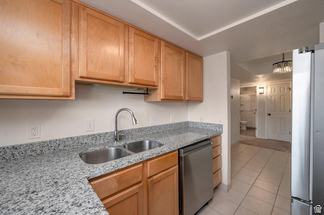 588 E Vine St S Unit 2C, Murray, UT 84107 - kitchen featuring light tile patterned floors, appliances with stainless steel finishes, light stone countertops, and a chandelier