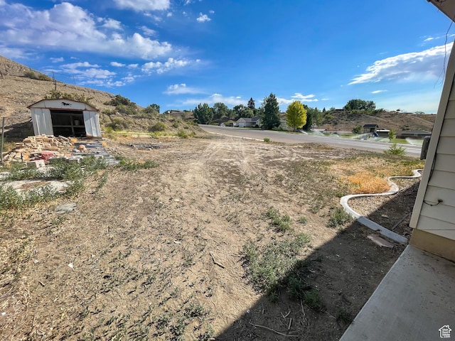 215 N Center St, Castle Dale, UT 84513 - view of yard featuring a shed