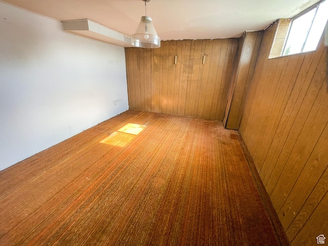 215 N Center St, Castle Dale, UT 84513 - spare room featuring wooden walls