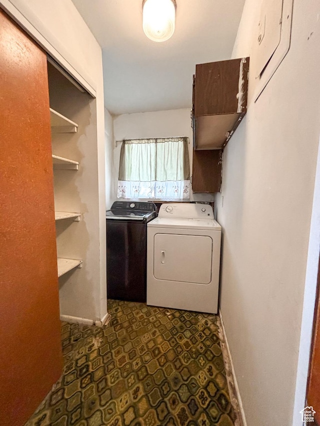 215 N Center St, Castle Dale, UT 84513 - laundry room with dark floors and independent washer and dryer