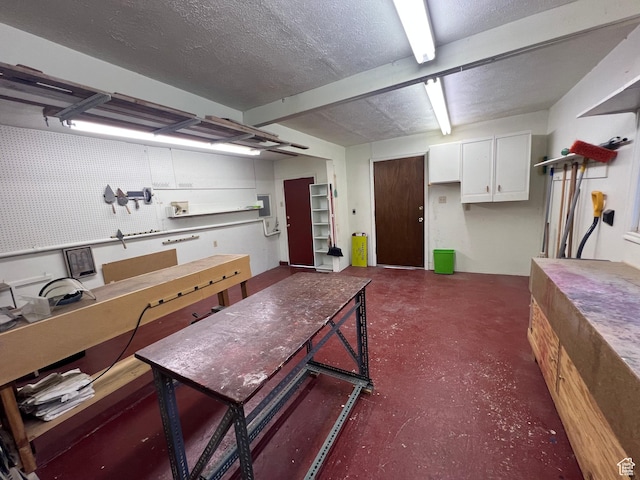 531 E 100 S, Logan, UT 84321 - basement with a textured ceiling and a workshop area