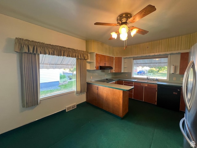 531 E 100 S, Logan, UT 84321 - kitchen featuring a peninsula, black appliances, brown cabinets, ceiling fan, and dark colored carpet