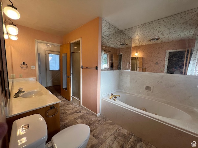 531 E 100 S, Logan, UT 84321 - bathroom with a stall shower, a jetted tub, and double vanity