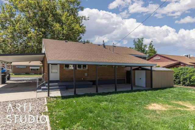 4746 S 250 W, Washington Terrace, UT 84405 - back of house featuring an attached carport, a shed, a lawn, brick siding, and roof with shingles