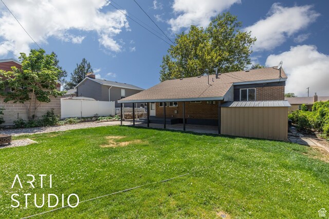 4746 S 250 W, Washington Terrace, UT 84405 - back of house featuring a patio, brick siding, a shingled roof, and a storage shed