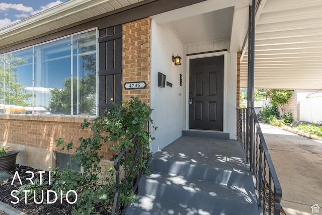4746 S 250 W, Washington Terrace, UT 84405 - view of exterior entry featuring brick siding