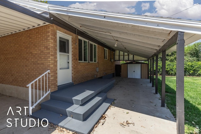 4746 S 250 W, Washington Terrace, UT 84405 - view of parking with a storage unit and an attached carport