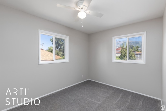 4746 S 250 W, Washington Terrace, UT 84405 - unfurnished room featuring plenty of natural light, dark carpet, and ceiling fan