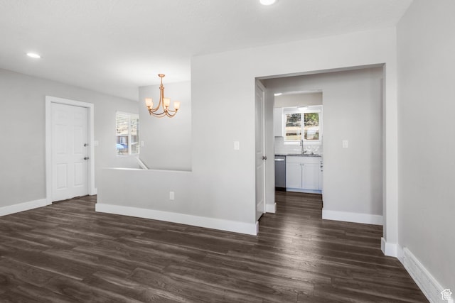 1500 N 350 W, Bountiful, UT 84010 - unfurnished room featuring dark wood finished floors, a chandelier, plenty of natural light, and recessed lighting