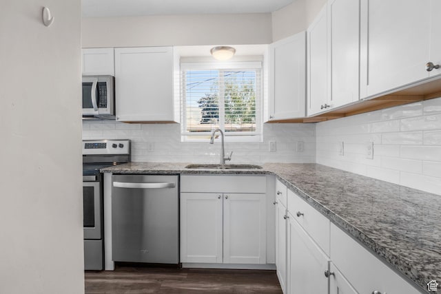 1500 N 350 W, Bountiful, UT 84010 - kitchen featuring appliances with stainless steel finishes, white cabinets, and dark wood-style flooring