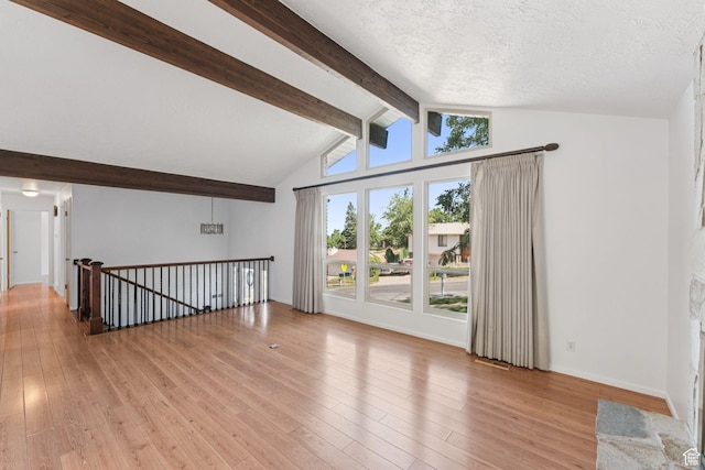 784 E 2150 S, Bountiful, UT 84010 - empty room with light wood-style flooring and a textured ceiling