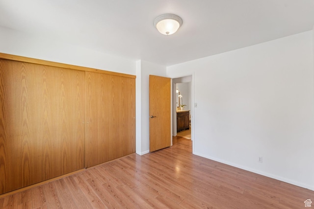 784 E 2150 S, Bountiful, UT 84010 - unfurnished bedroom featuring wood finished floors and a closet