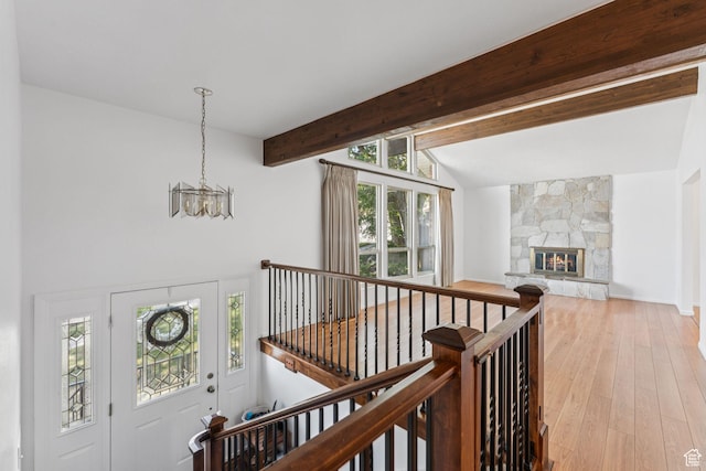 784 E 2150 S, Bountiful, UT 84010 - hall featuring a chandelier, light wood finished floors, and an upstairs landing