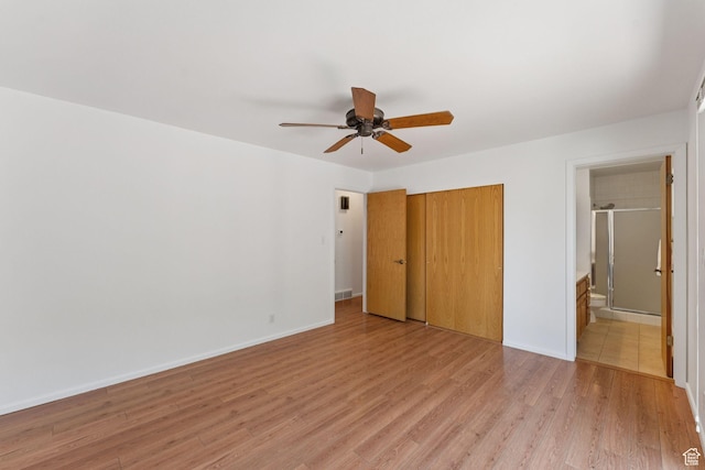 784 E 2150 S, Bountiful, UT 84010 - unfurnished bedroom with a closet, light wood-style flooring, connected bathroom, and ceiling fan