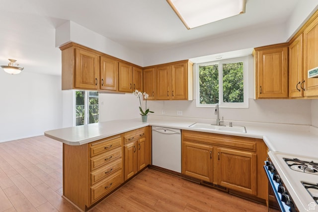 784 E 2150 S, Bountiful, UT 84010 - kitchen with a peninsula, healthy amount of natural light, white dishwasher, and light countertops