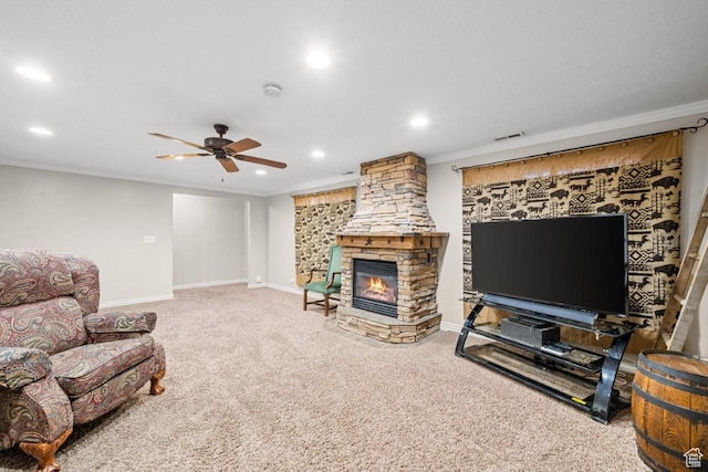 1458 N 2400 W, Clinton, UT 84015 - living area with crown molding, recessed lighting, a ceiling fan, carpet flooring, and a stone fireplace