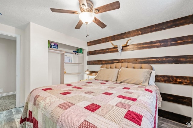 1458 N 2400 W, Clinton, UT 84015 - bedroom with ceiling fan and wood finished floors