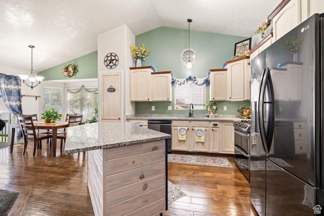 1458 N 2400 W, Clinton, UT 84015 - kitchen with a chandelier, appliances with stainless steel finishes, high vaulted ceiling, dark wood-type flooring, and pendant lighting