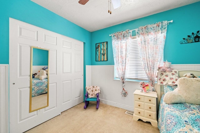 1458 N 2400 W, Clinton, UT 84015 - sitting room with wainscoting, carpet, ceiling fan, and a textured ceiling
