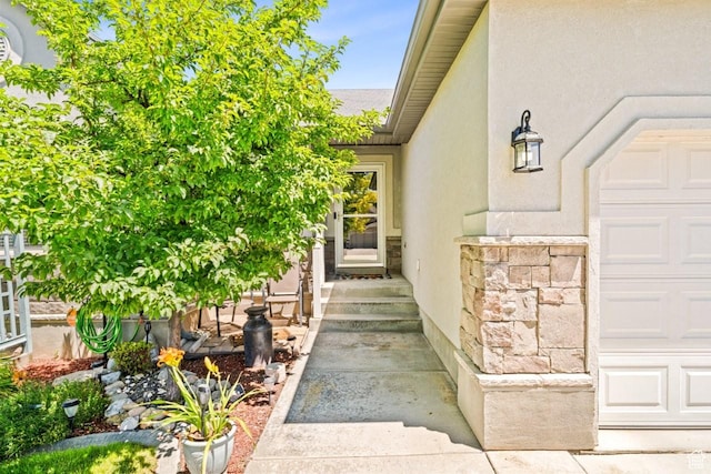 1458 N 2400 W, Clinton, UT 84015 - doorway to property featuring stucco siding and stone siding