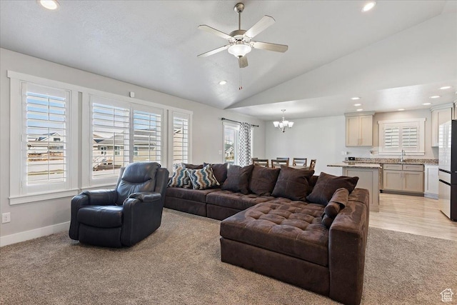 4448 W 5325 S, Hooper, UT 84315 - living room with light colored carpet, lofted ceiling, a chandelier, recessed lighting, and ceiling fan