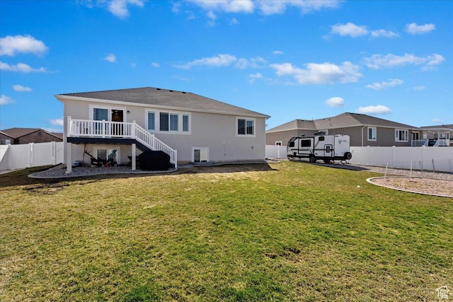 4448 W 5325 S, Hooper, UT 84315 - rear view of house with a fenced backyard, a wooden deck, and stucco siding