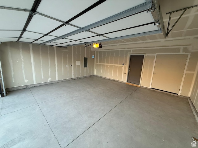 652 E 12225 S Unit 38, Draper, UT 84020 - garage with electric panel and a garage door opener