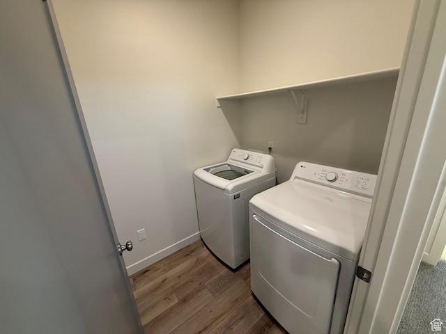 652 E 12225 S Unit 38, Draper, UT 84020 - washroom with washer and clothes dryer and wood finished floors
