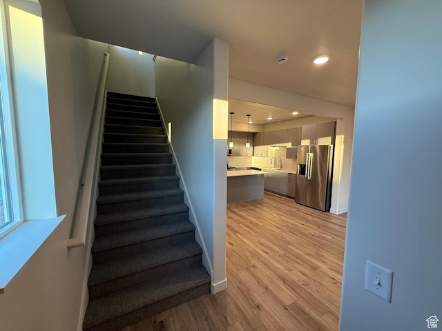 652 E 12225 S Unit 38, Draper, UT 84020 - stairway featuring wood finished floors and recessed lighting