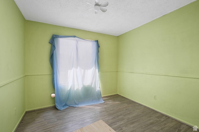 1469 E Winterwood Cir, Sandy, UT 84092 - spare room featuring wood finished floors, a textured ceiling, and a ceiling fan