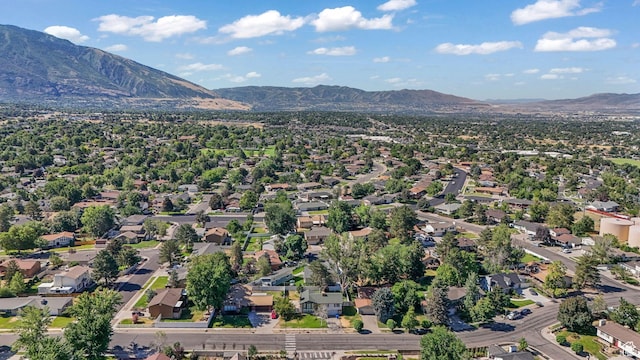 1469 E Winterwood Cir, Sandy, UT 84092 - aerial perspective of suburban area with mountains