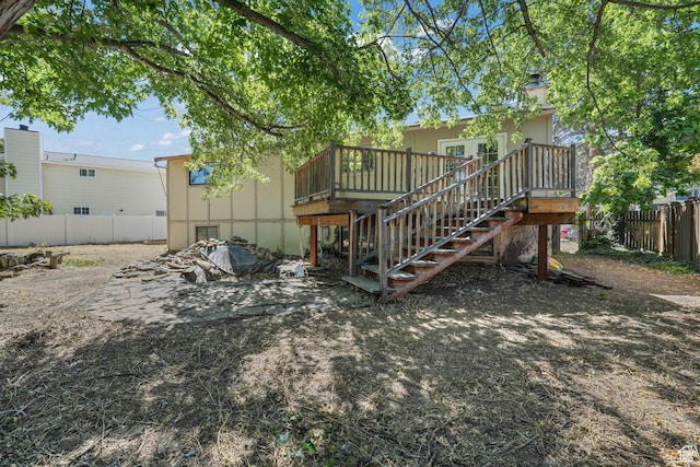 1469 E Winterwood Cir, Sandy, UT 84092 - back of house with a deck, stairs, and a chimney