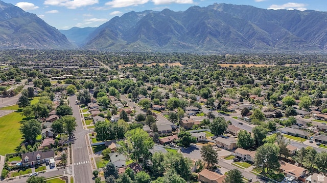 1469 E Winterwood Cir, Sandy, UT 84092 - aerial view of residential area featuring a mountainous background