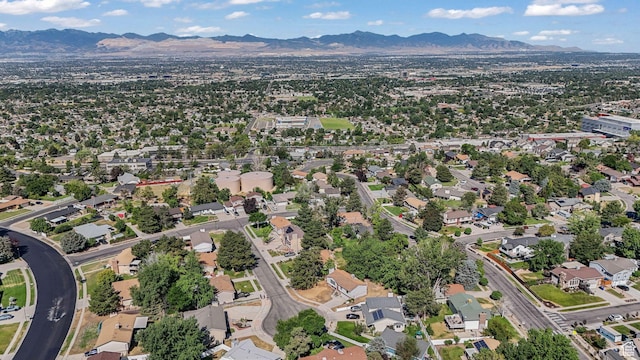 1469 E Winterwood Cir, Sandy, UT 84092 - aerial view of property's location featuring mountains and nearby suburban area