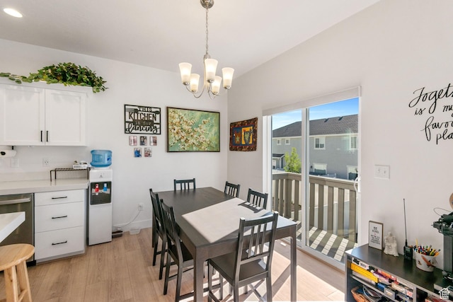 7310 N Green Pasture Ln, Eagle Mountain, UT 84005 - dining area with a chandelier and light wood finished floors