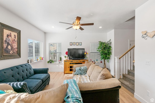 7310 N Green Pasture Ln, Eagle Mountain, UT 84005 - living room with light wood-style floors, a ceiling fan, stairs, and recessed lighting