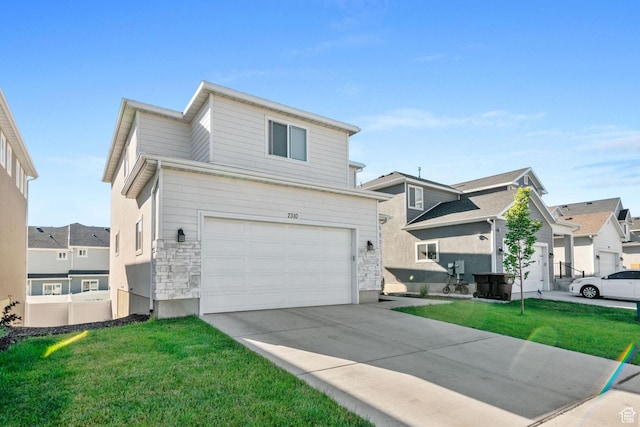 7310 N Green Pasture Ln, Eagle Mountain, UT 84005 - traditional-style home featuring a garage, concrete driveway, a front lawn, stone siding, and a residential view