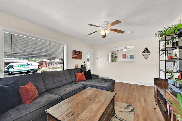 1634 N 350 W, Sunset, UT 84015 - living room featuring a ceiling fan and wood finished floors