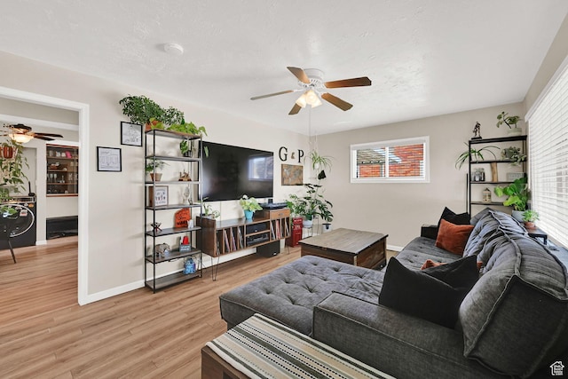 1634 N 350 W, Sunset, UT 84015 - living room featuring a ceiling fan and light wood-type flooring