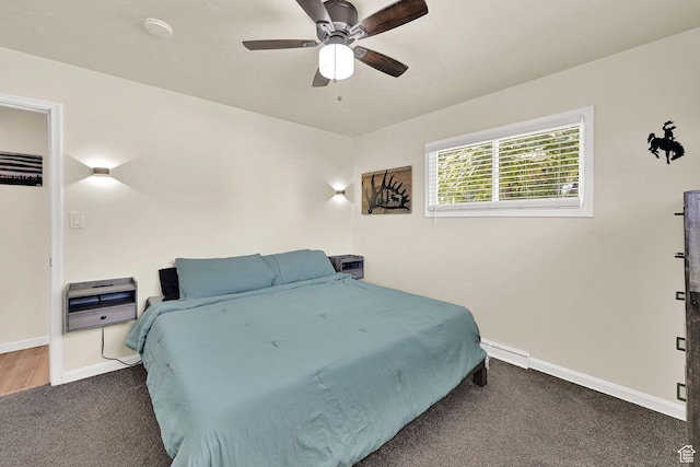 1634 N 350 W, Sunset, UT 84015 - bedroom with carpet floors, ceiling fan, and a baseboard radiator