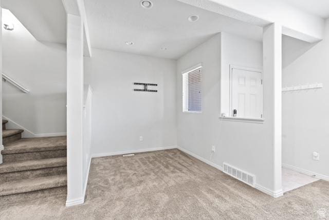 3057 S Finsbury Ln, West Valley City, UT 84120 - below grade area with carpet floors, stairway, and recessed lighting