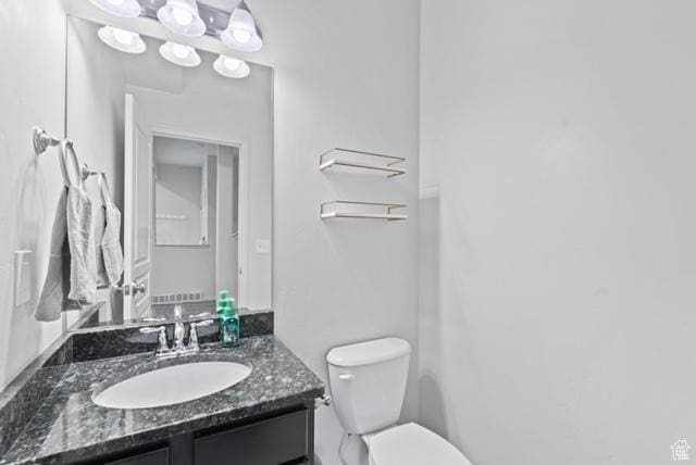 3057 S Finsbury Ln, West Valley City, UT 84120 - bathroom featuring toilet and vanity
