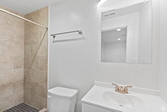 3057 S Finsbury Ln, West Valley City, UT 84120 - bathroom featuring vanity and tiled shower