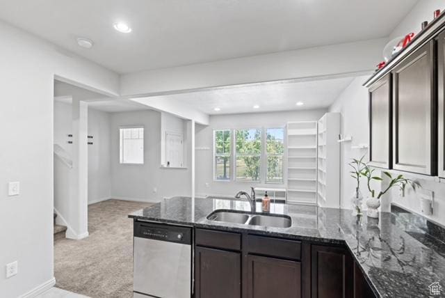 3057 S Finsbury Ln, West Valley City, UT 84120 - kitchen featuring light carpet, dishwasher, a peninsula, dark stone countertops, and recessed lighting