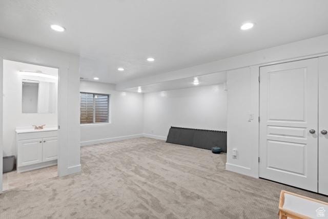 3057 S Finsbury Ln, West Valley City, UT 84120 - finished below grade area with light colored carpet and recessed lighting
