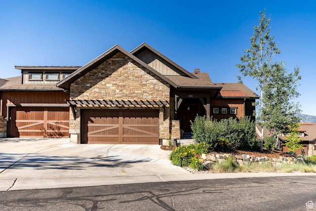 1658 E Viewside Cir, Hideout, UT 84036 - craftsman-style home featuring concrete driveway, a garage, stone siding, and board and batten siding