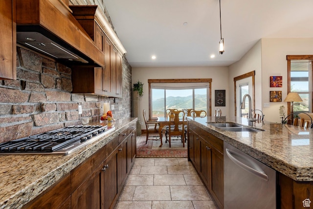 1658 E Viewside Cir, Hideout, UT 84036 - kitchen with stainless steel appliances, light stone countertops, tasteful backsplash, recessed lighting, and premium range hood