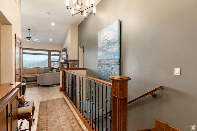1658 E Viewside Cir, Hideout, UT 84036 - hall featuring an upstairs landing, a chandelier, vaulted ceiling, and recessed lighting