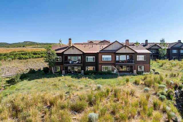 1658 E Viewside Cir, Hideout, UT 84036 - back of house with a balcony and a chimney